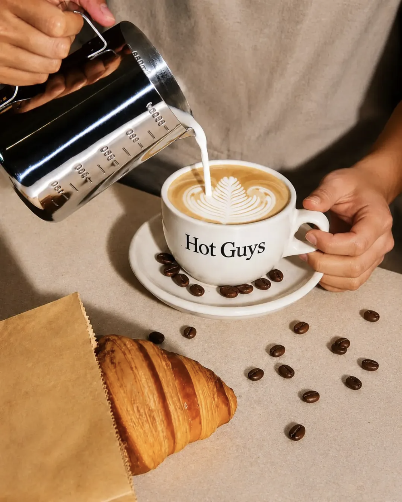 Hot Guys Coffee — latte being poured